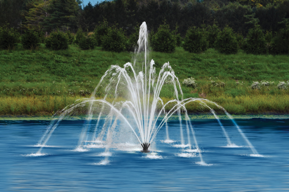 Aqua Control Select Series 2 Trillium fountain spray pattern running on a pond in daylight