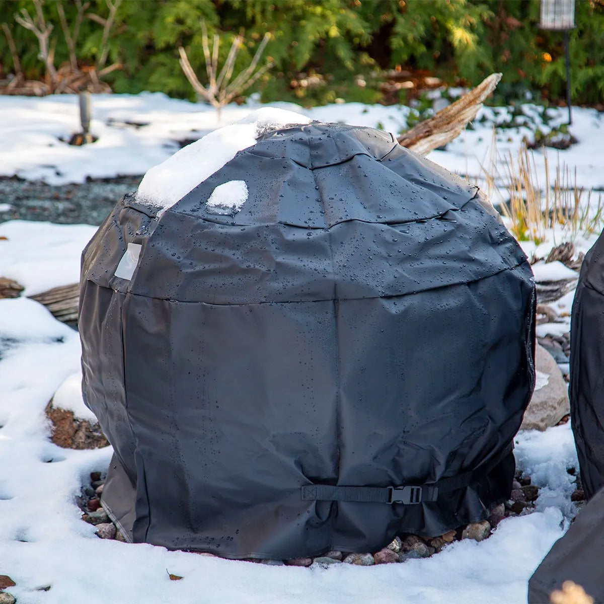 Aquascape fountain cover fitted over a sphere fountain